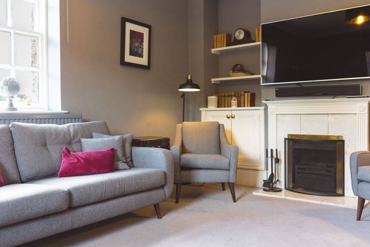 Ballogie House snug lounge and tv room with open fire place