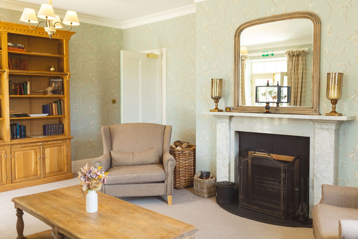 Ballogie House Sitting room and open fire